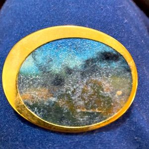Vintage, hand-painted off-center gold-tone brooch